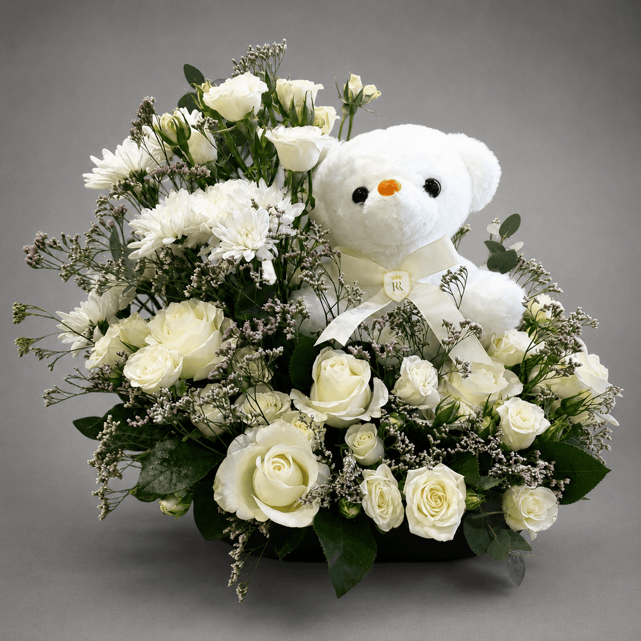 Teddy's Floral Embrace