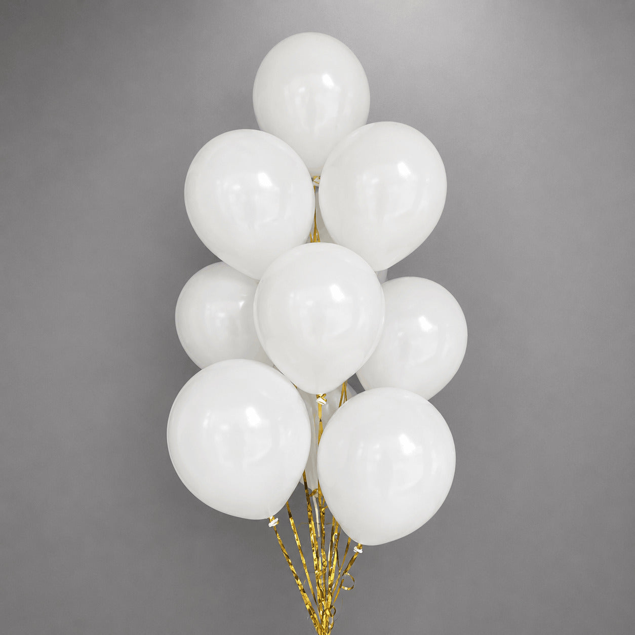White Latex Balloon Bouquet with Gold Ribbons
