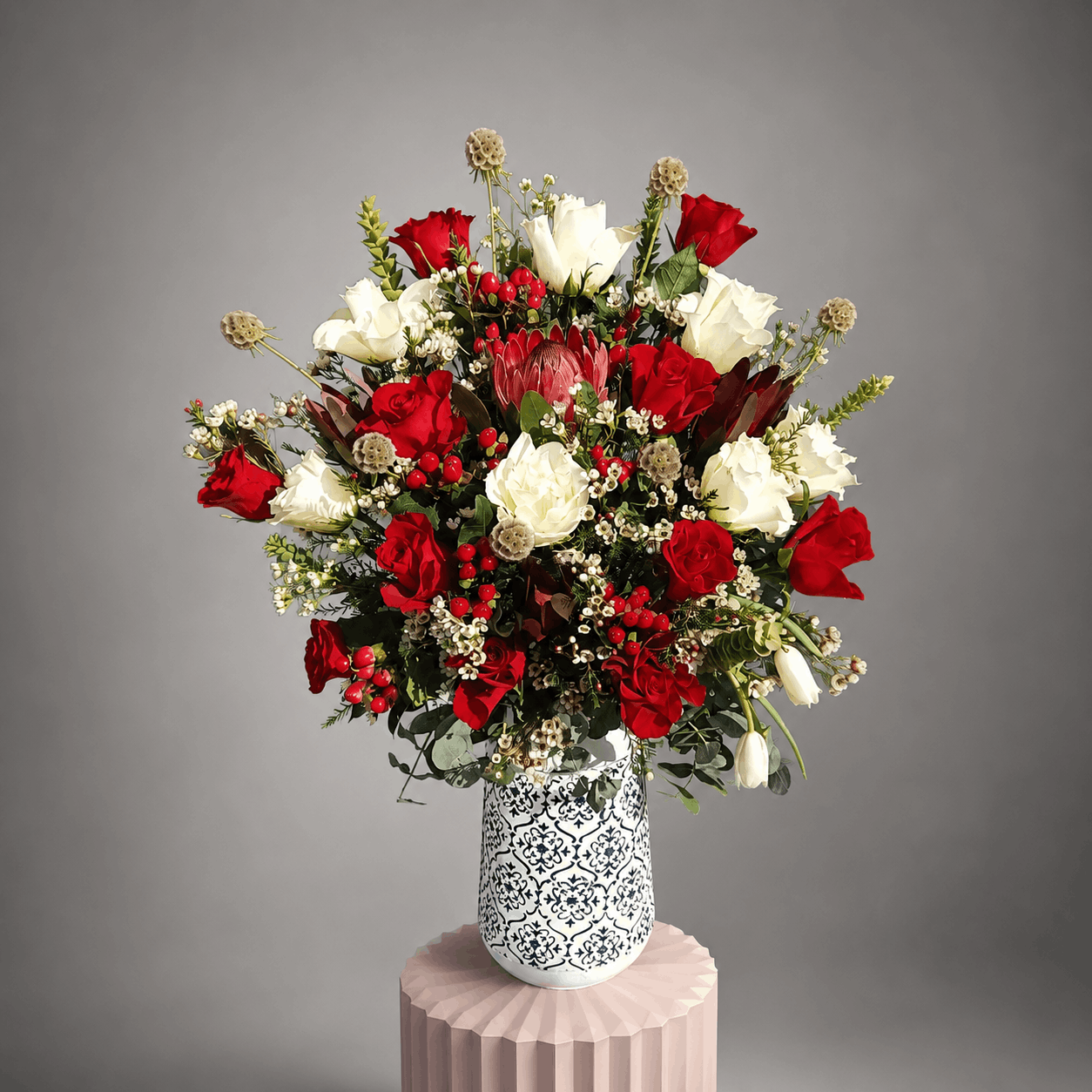 Red Rose & King Protea Moroccan Vase Arrangement