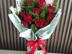 Vintage Charm: 12 Red Roses in Paper Wrap