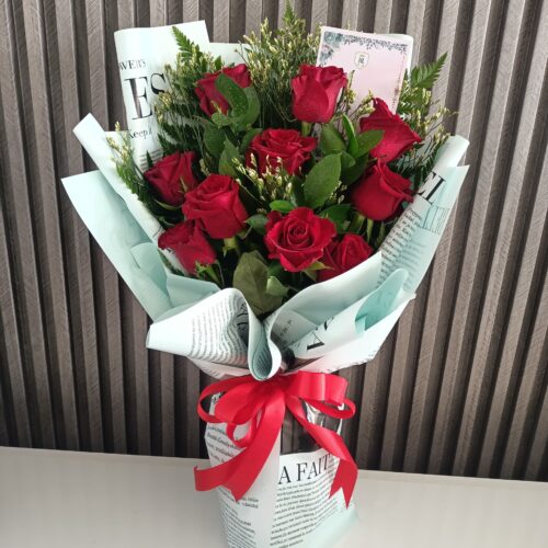 Vintage Charm: 12 Red Roses in Paper Wrap