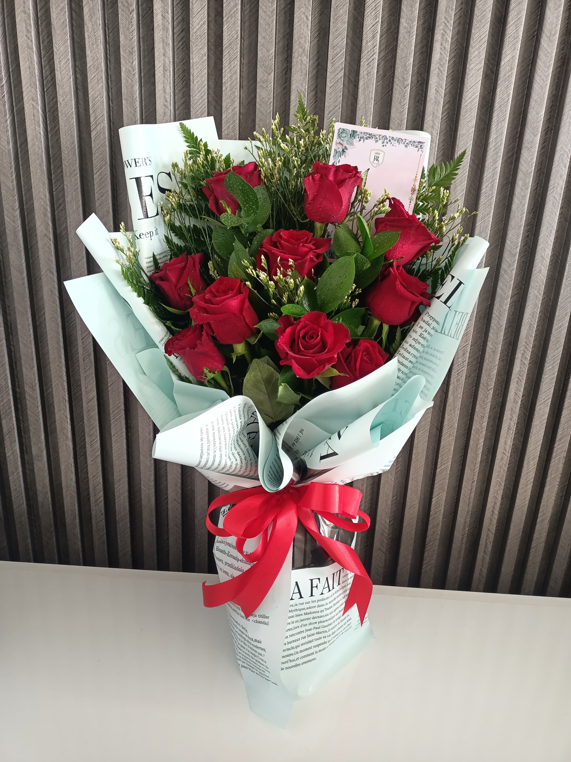 Vintage Charm: 12 Red Roses in Paper Wrap