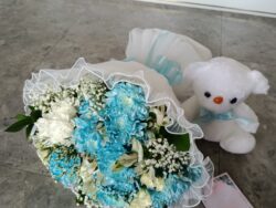 Blue Breeze: Baby Blue Blooms with Teddy Surprise