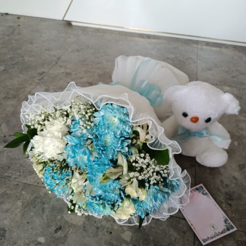 Blue Breeze: Baby Blue Blooms with Teddy Surprise