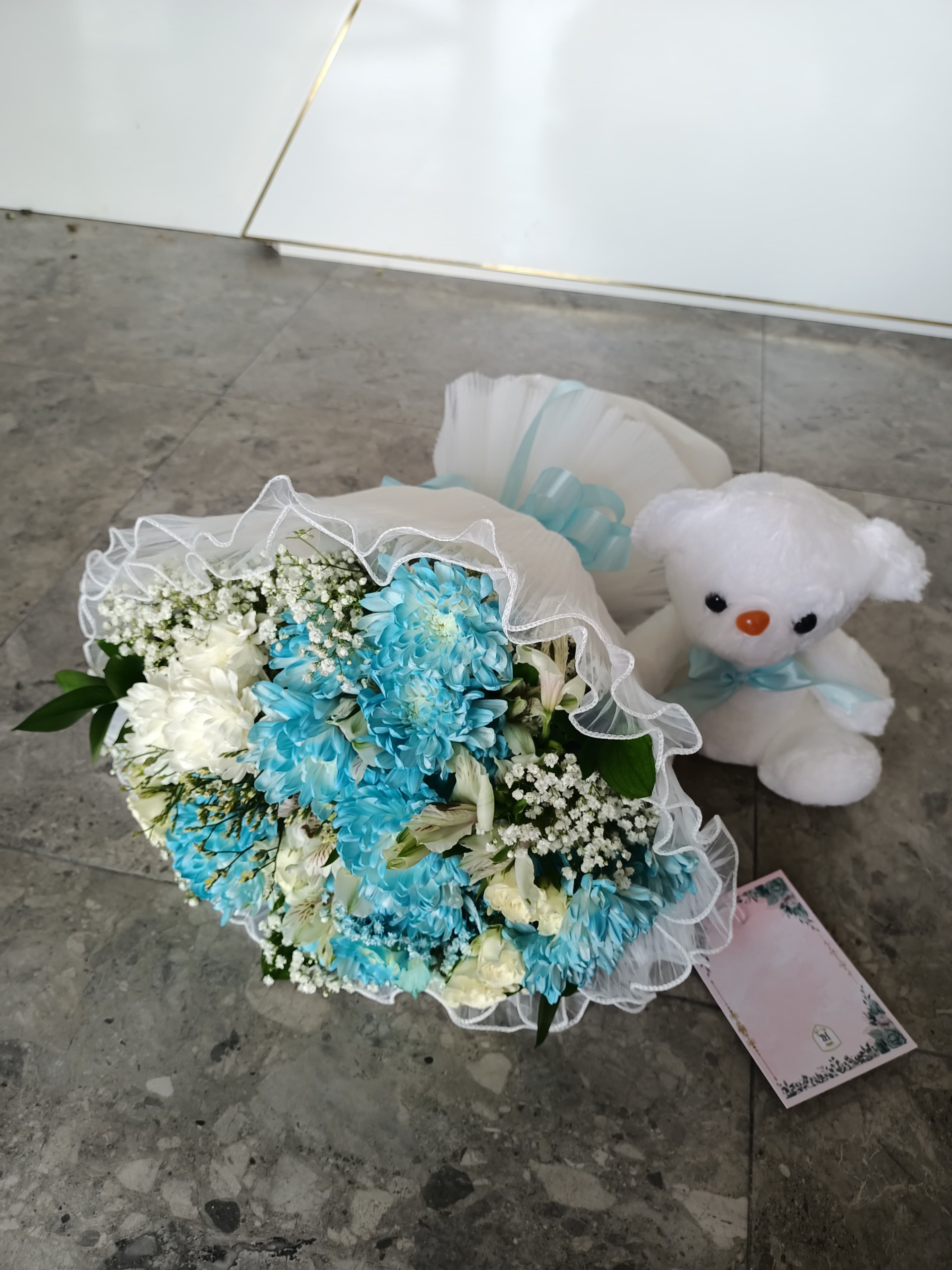 Blue Breeze: Baby Blue Blooms with Teddy Surprise