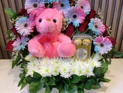 Sweet Embrace: Colorful Blooms, Teddy & Treats