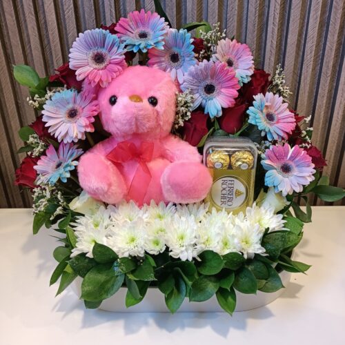 Sweet Embrace: Colorful Blooms, Teddy & Treats