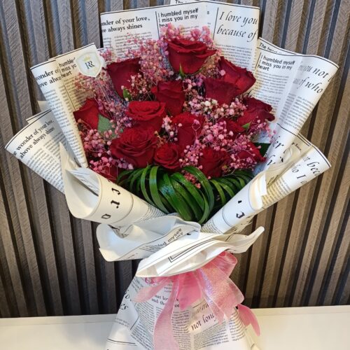 Love Letter Roses: Red Blooms in Script Wrap