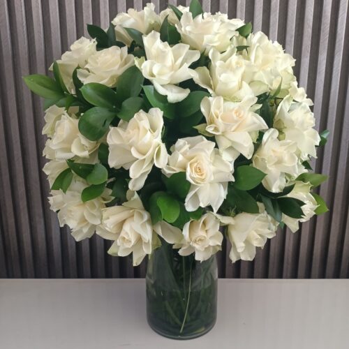 Gardenia Grandeur: White Blooms in Glass