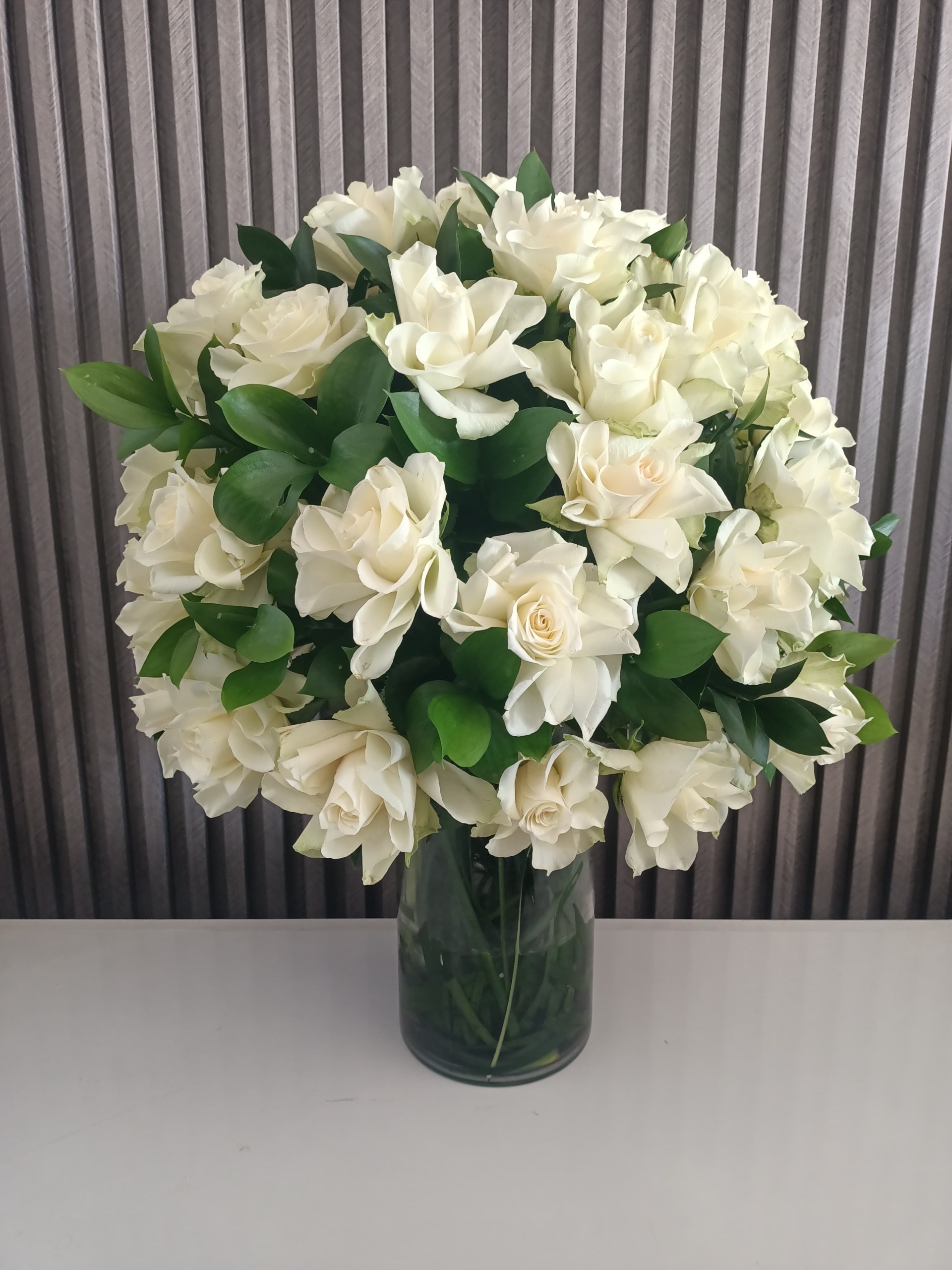 Gardenia Grandeur: White Blooms in Glass